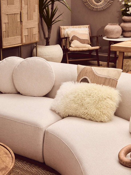 Orsina Square Cushion in a cosy living room setting with circular cushions and stylish decor