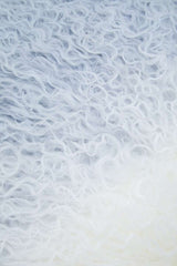 Soft Orsina Square Cushion with a fluffy white texture for stylish home decor