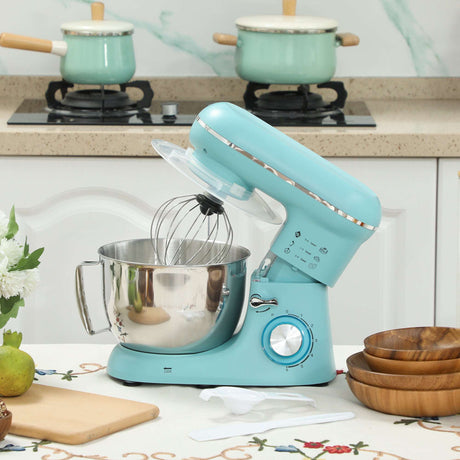 Wise Galleria Stand Mixer in teal with stainless steel bowl and whisk attachment on kitchen counter