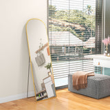 Elegant Standing Mirror with Gold Frame Reflecting a Bright Room and Decorative Elements