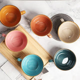Colourful Stoneware Cup Set in Various Shades on a Wooden Tray for Stylish Dining