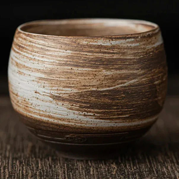 Handcrafted Nisu Home Stoneware Mug with a Rustic Brown and Cream Finish for Hot Beverages