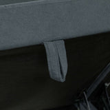 Close-up of a grey fabric Storage Sofa featuring a convenient handle for easy adjustment