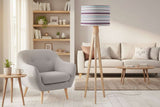 Stylish lampshade featuring stripes, enhancing modern decor in a bright living room