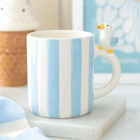 Striped Mug with Blue and White Stripes and Seagull Handle for Enjoying Your Favourite Drinks