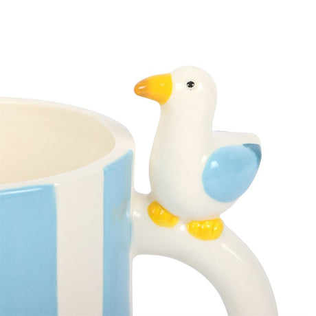 Striped Mug featuring a cute seagull design on the handle for a whimsical touch