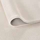 Soft beige Striped Rug with a textured surface, perfect for adding warmth to any room