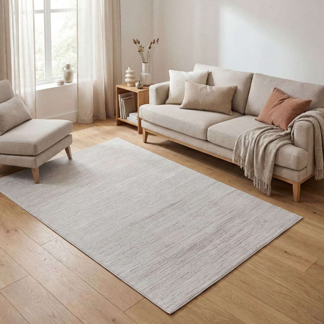 Stylish Striped Rug in a modern living room with soft furniture and natural light