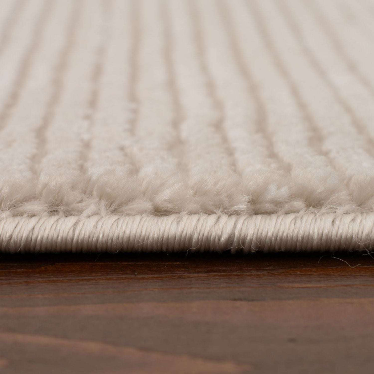 Soft cream Striped Rug by The Rugs with a textured surface for a stylish home decor