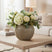 Striped Vase showcasing fresh flowers on a coffee table in a stylish living room
