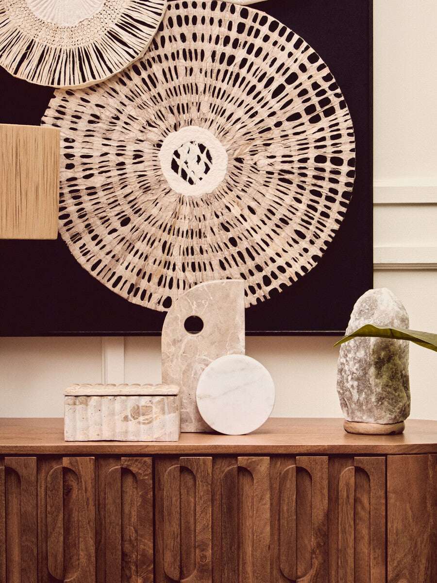 Orsina Marble Sculpture displayed on a wooden console table alongside decorative ornaments
