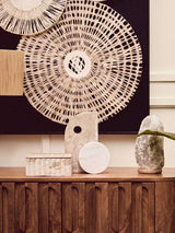 Orsina Marble Sculpture displayed on a wooden console table alongside decorative ornaments