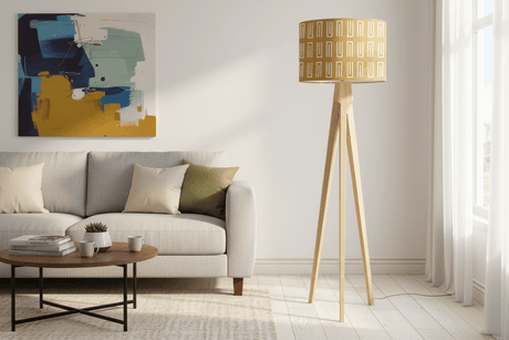 Stylish lampshade in yellow with geometric pattern, complementing a modern living room setting