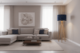Stylish Shadow Bright lampshade in blue on a tall floor lamp in a modern living room setting