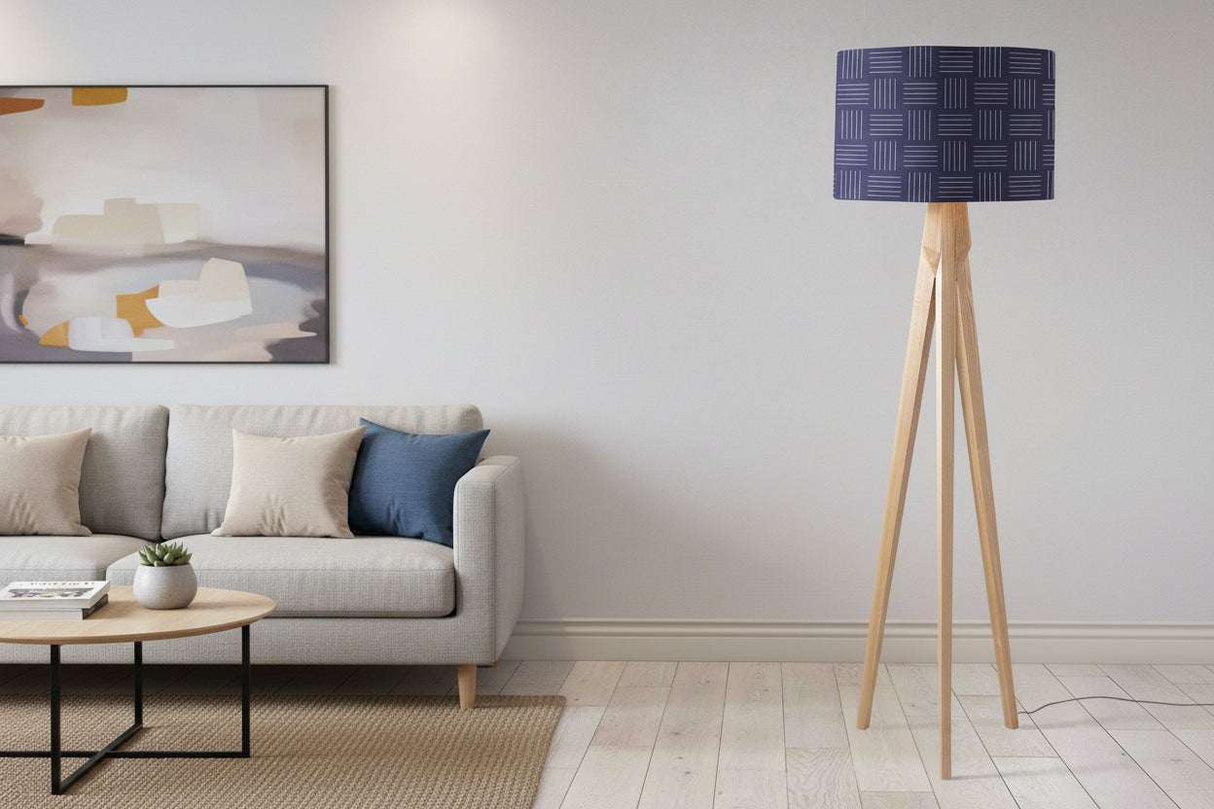 Shadow Bright lampshade in geometric blue design on a modern floor lamp in a stylish living room