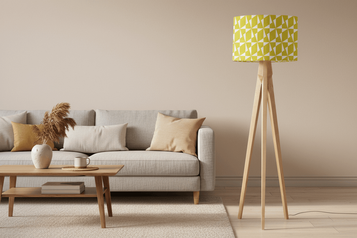 Stylish floor lamp with a yellow geometric lampshade, complementing a modern living room decor