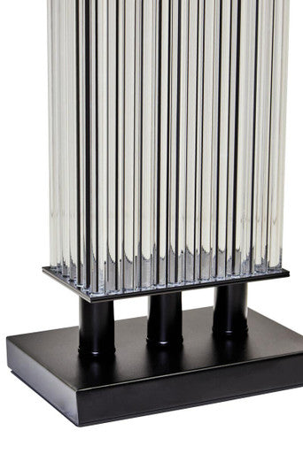 Orsina Table Lamp with a sleek ribbed design and a sturdy black base for modern interiors