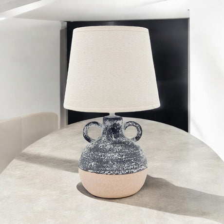 MSL Table Lamp with a textured ceramic base and a neutral fabric shade for modern decor