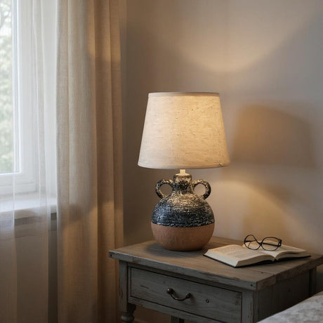 Stylish MSL Table Lamp with a textured base and natural fabric shade, ideal for cosy living spaces