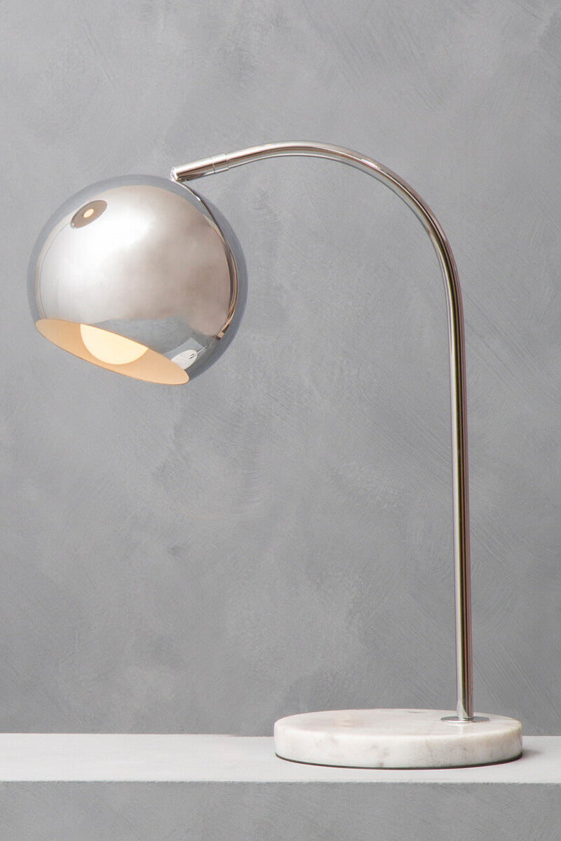 Orsina Table Lamp with a sleek chrome shade and marble base for modern home decor