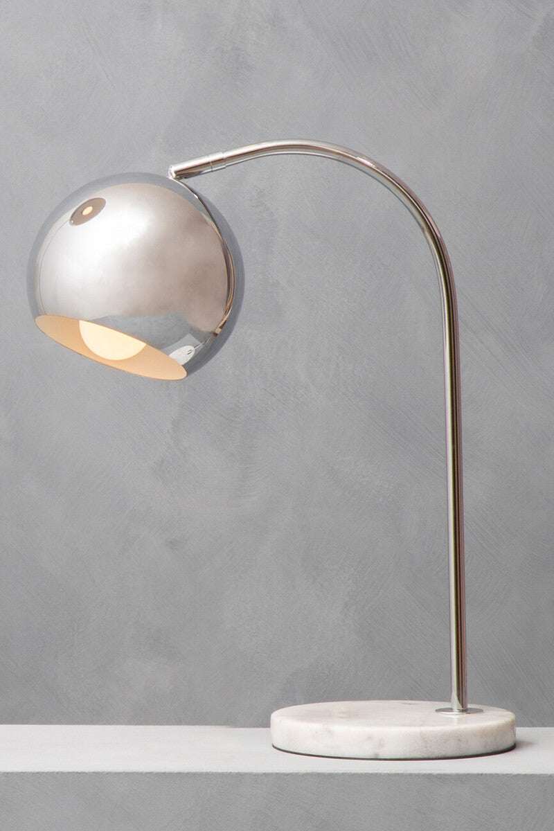 Orsina Table Lamp with a sleek chrome shade and marble base for modern home decor