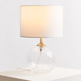 Orsina Table Lamp with a clear globe base and white shade, ideal for modern interiors