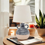Stylish MSL Table Lamp with a textured ceramic base and a neutral fabric shade for modern decor