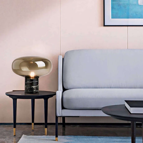 Stylish Nisu Home table lamp beside a modern sofa in an elegant living room setting