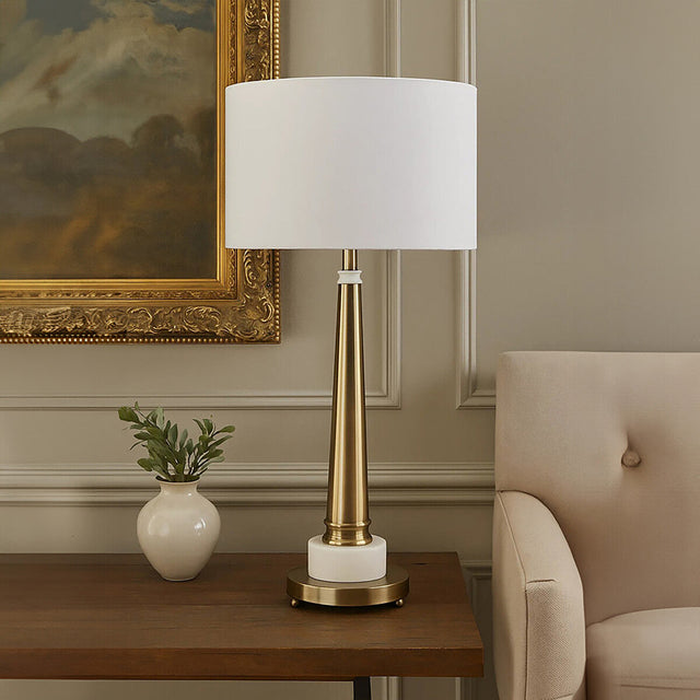 Elegant Orsina Table Lamp with a gold finish and white shade for stylish lighting