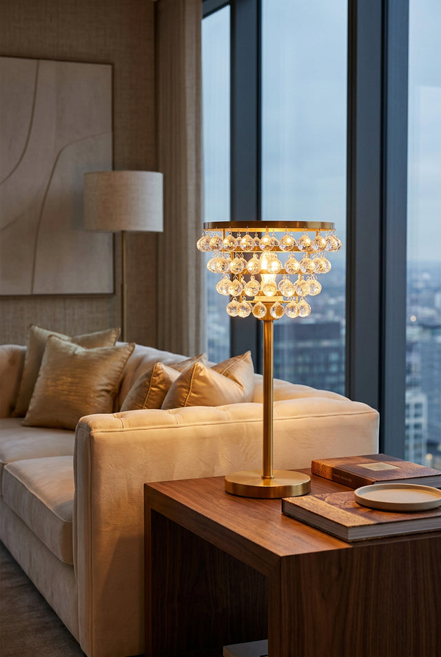 Stylish Orsina table lamp with crystal accents, illuminating a modern living space beside a sofa