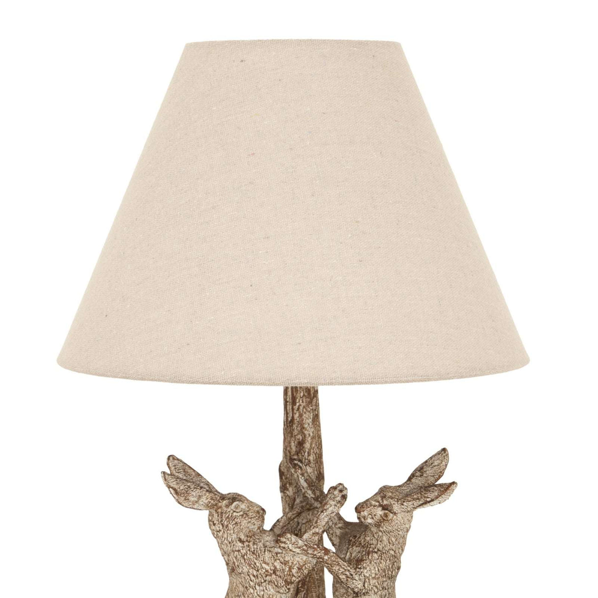 Shades 4 Seasons Table Lamp with a decorative rabbit base and a cream fabric shade