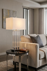 Orsina Table Lamp with a sleek design and fabric shade, perfect for modern living rooms