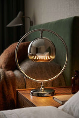 Orsina Table Lamp with a sleek metallic design, ideal for bedside lighting and modern decor