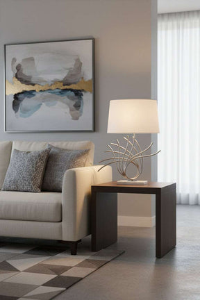 Orsina Table Lamp with a stylish silver base and white shade, perfect for contemporary living rooms