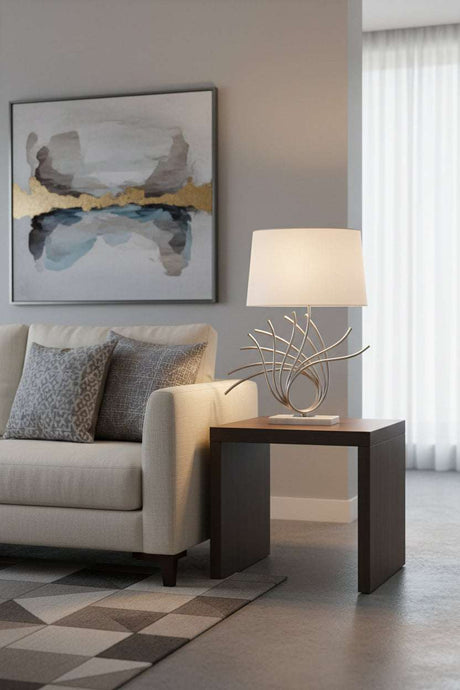 Orsina Table Lamp with a stylish silver base and white shade, perfect for contemporary living rooms