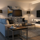 Stylish Orsina Table Lamp with a modern design, illuminating a chic living room setting