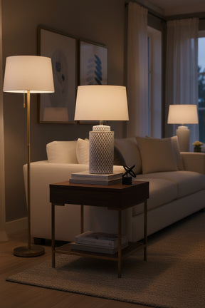 Orsina Table Lamp on side table in a cozy living room, providing warm ambient light