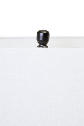 Orsina Table Lamp featuring a sleek design with a black knob on a white shade