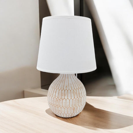 Stylish MSL Table Lamp with a textured base and white fabric shade, perfect for modern interiors