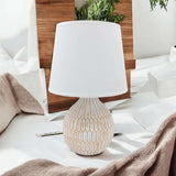MSL Table Lamp with a textured ceramic base and a white shade for stylish home lighting
