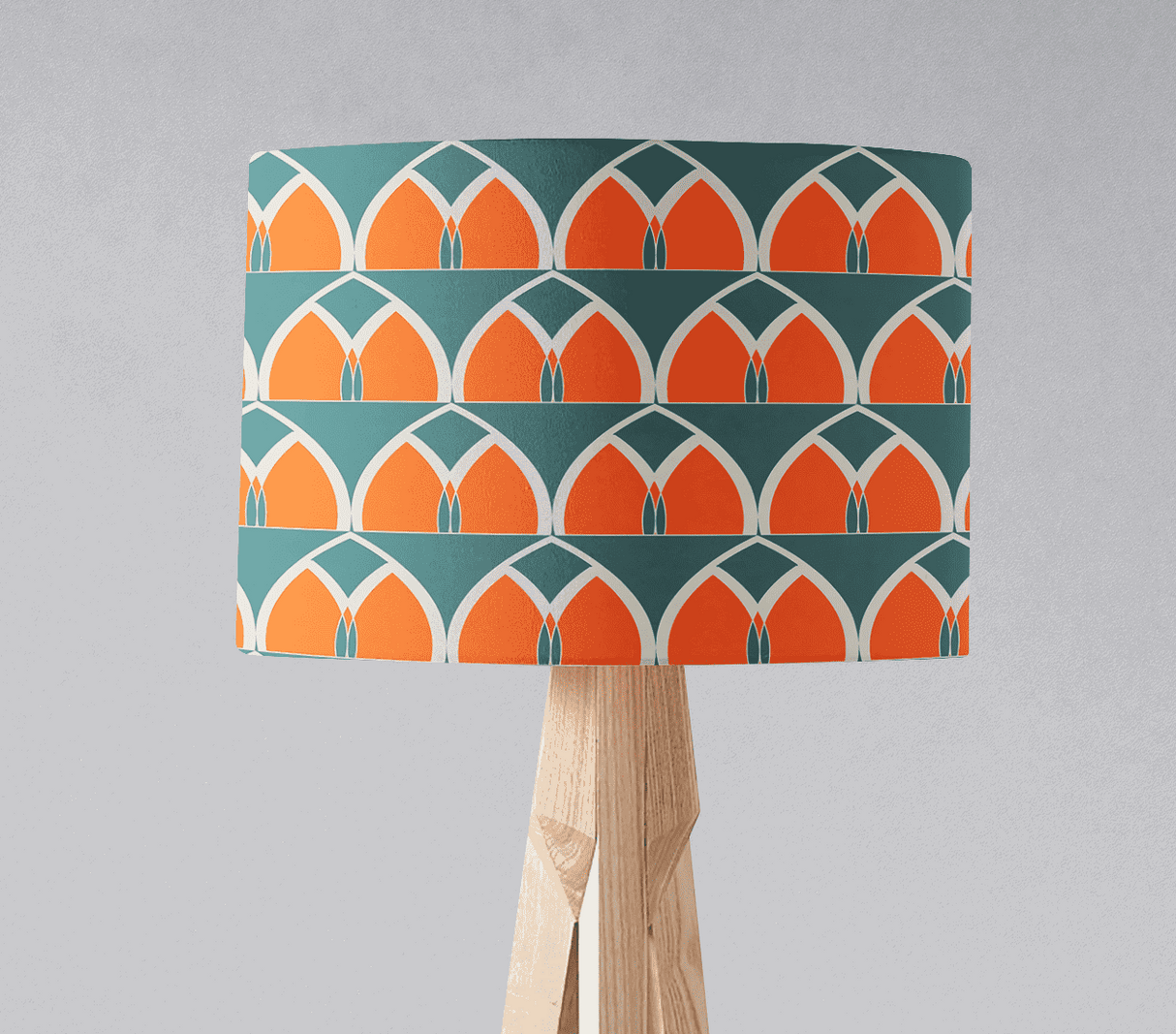 Shadow Bright colourful lampshade with orange and teal pattern on a light wooden lamp base