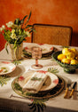 Casa by Josephine Jenno Tablecloth featuring a tropical palm leaf design, perfect for elegant dining