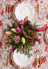 Casa by Josephine Jenno floral tablecloth with elegant dinnerware and vibrant floral centrepiece