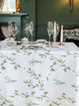 Avalon Home UK Floral Tablecloth on Elegant Dining Table with Glassware and Candles