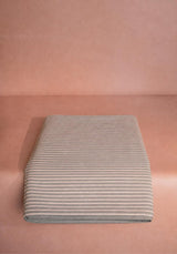 Casa by Josephine Jenno striped tablecloth in neutral tones, ideal for elegant dining settings