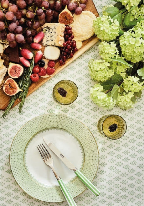 Elegant Casa by Josephine Jenno tablecloth with floral design, set for a dining experience