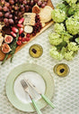 Elegant Casa by Josephine Jenno tablecloth with floral design, set for a dining experience