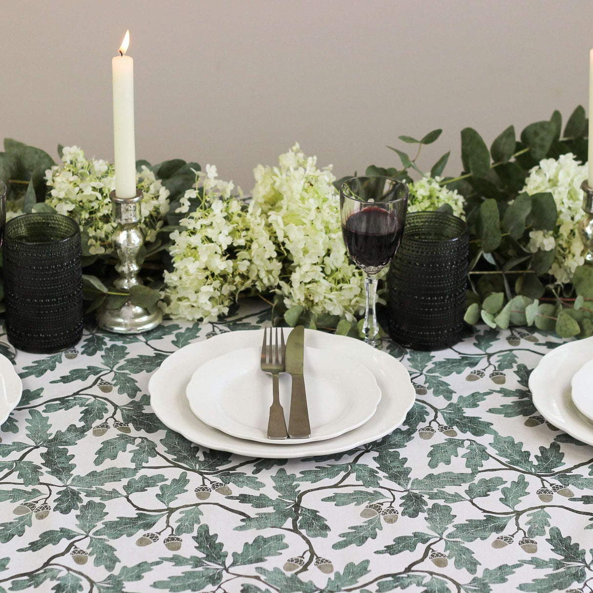 Elegant green oak leaf patterned tablecloth from Avalon Home UK for stylish dining occasions