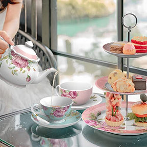 Elegant Afternoon Tea Set featuring floral teapot, cups, and tiered stand with assorted pastries