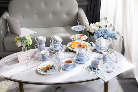 Elegant Cake Plate Set from London Boutique Lifestyle with floral design and matching teacups for afternoon tea
